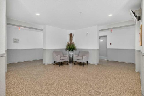 4316-10 Prestwick Bay Se, Calgary, AB - Indoor Photo Showing Other Room