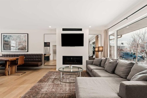212 Vantage Place Nw, Calgary, AB - Indoor Photo Showing Living Room With Fireplace