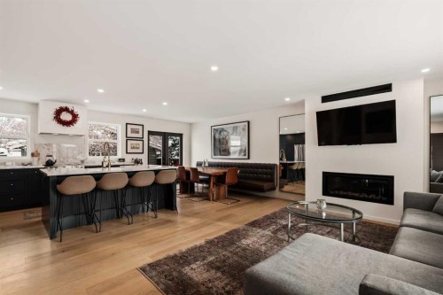 212 Vantage Place Nw, Calgary, AB - Indoor Photo Showing Living Room With Fireplace