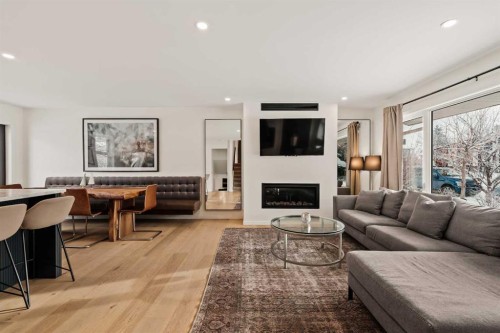 212 Vantage Place Nw, Calgary, AB - Indoor Photo Showing Living Room With Fireplace