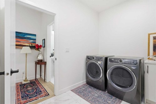 119 Marina Cove Se, Calgary, AB - Indoor Photo Showing Laundry Room