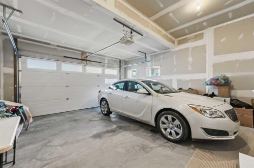 119 Marina Cove Se, Calgary, AB - Indoor Photo Showing Garage