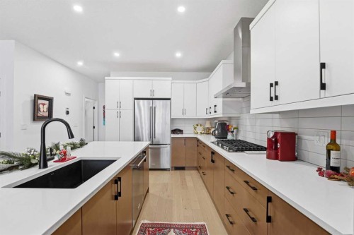 119 Marina Cove Se, Calgary, AB - Indoor Photo Showing Kitchen With Upgraded Kitchen