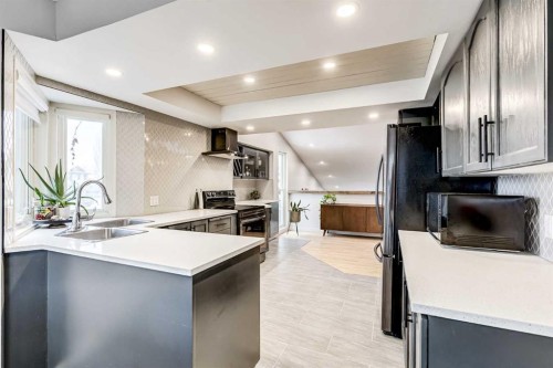 412 Mckerrell Place Se, Calgary, AB - Indoor Photo Showing Kitchen With Upgraded Kitchen