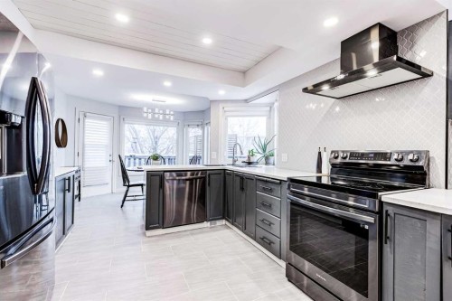 412 Mckerrell Place Se, Calgary, AB - Indoor Photo Showing Kitchen With Upgraded Kitchen