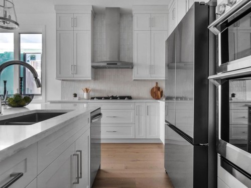 27 Royal Birch Cove Nw, Calgary, AB - Indoor Photo Showing Kitchen With Double Sink With Upgraded Kitchen
