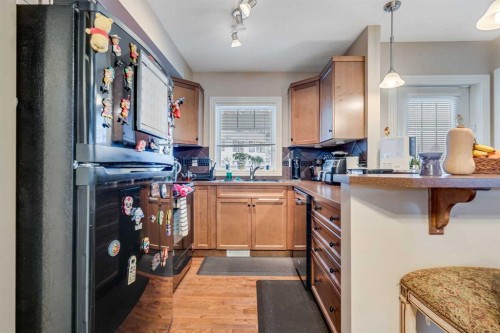 3 Royal Oak Plaza Nw, Calgary, AB - Indoor Photo Showing Kitchen With Double Sink