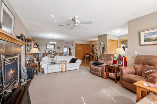 40 Green Meadow Drive, Strathmore, AB - Indoor Photo Showing Living Room With Fireplace