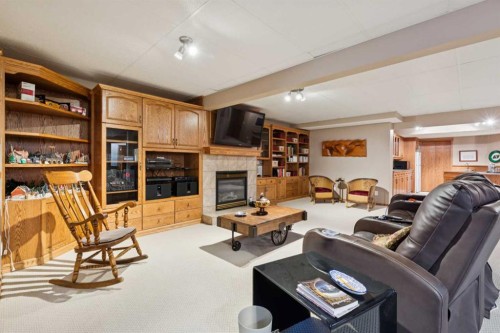 123 Whispering Way, Vulcan, AB - Indoor With Fireplace