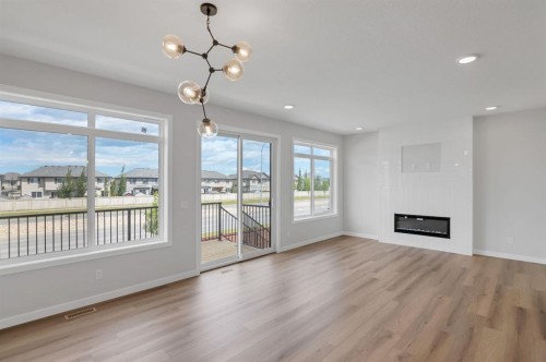 72 Lewiston Drive Ne, Calgary, AB - Indoor Photo Showing Living Room With Fireplace