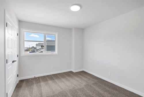72 Lewiston Drive Ne, Calgary, AB - Indoor Photo Showing Other Room