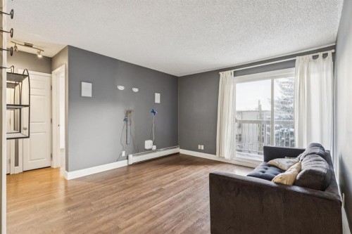 405-2140 17A Street Sw, Calgary, AB - Indoor Photo Showing Living Room