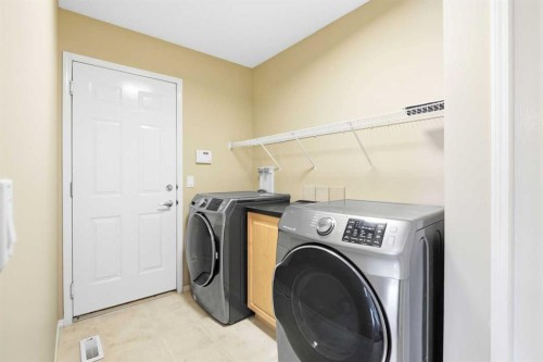 202 Panamount Court Nw, Calgary, AB - Indoor Photo Showing Laundry Room