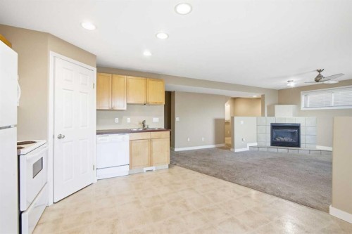 202 Panamount Court Nw, Calgary, AB - Indoor Photo Showing Kitchen With Double Sink