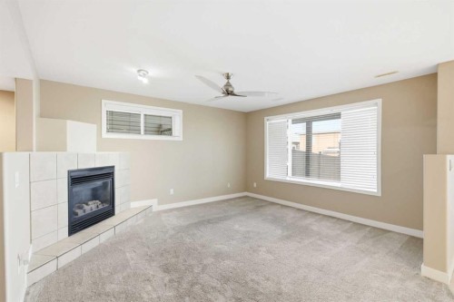 202 Panamount Court Nw, Calgary, AB - Indoor With Fireplace