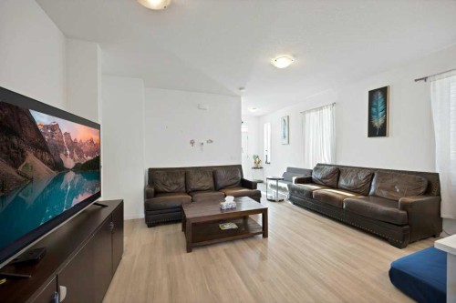 117 South Point Sw, Airdrie, AB - Indoor Photo Showing Living Room