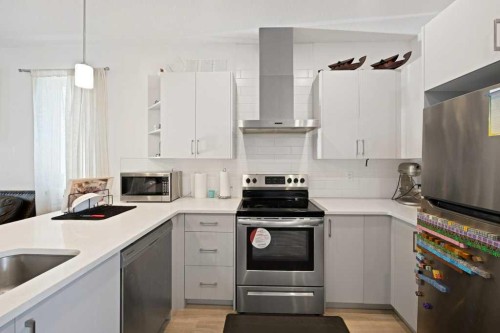 117 South Point Sw, Airdrie, AB - Indoor Photo Showing Kitchen