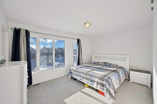 117 South Point Sw, Airdrie, AB - Indoor Photo Showing Bedroom