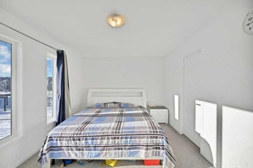 117 South Point Sw, Airdrie, AB - Indoor Photo Showing Bedroom