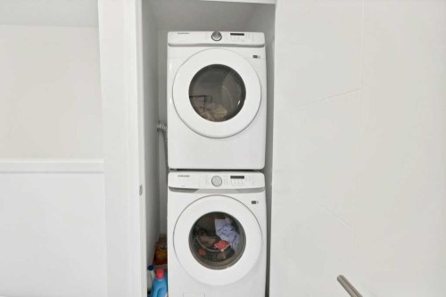 117 South Point Sw, Airdrie, AB - Indoor Photo Showing Laundry Room