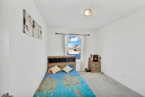 117 South Point Sw, Airdrie, AB - Indoor Photo Showing Bedroom