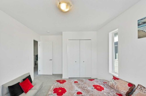 117 South Point Sw, Airdrie, AB - Indoor Photo Showing Bedroom