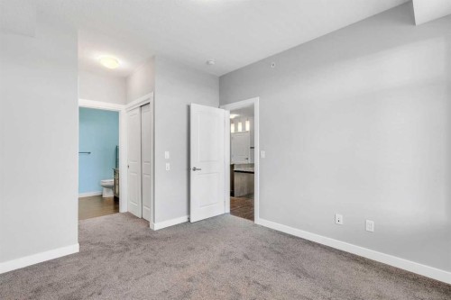 2409-3727 Sage Hill Drive Nw, Calgary, AB - Indoor Photo Showing Other Room