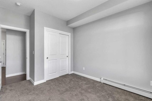 2409-3727 Sage Hill Drive Nw, Calgary, AB - Indoor Photo Showing Other Room