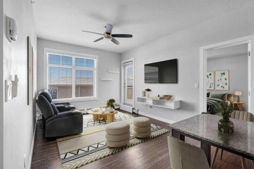 2409-3727 Sage Hill Drive Nw, Calgary, AB - Indoor Photo Showing Living Room