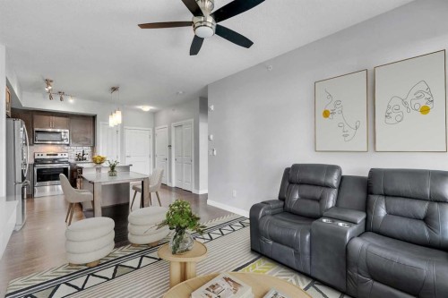 2409-3727 Sage Hill Drive Nw, Calgary, AB - Indoor Photo Showing Living Room