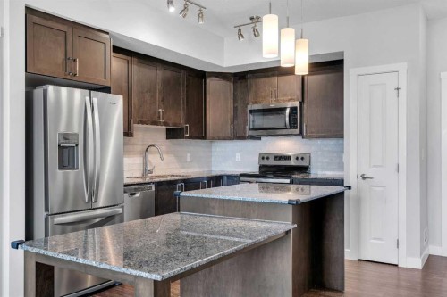 2409-3727 Sage Hill Drive Nw, Calgary, AB - Indoor Photo Showing Kitchen With Stainless Steel Kitchen With Upgraded Kitchen