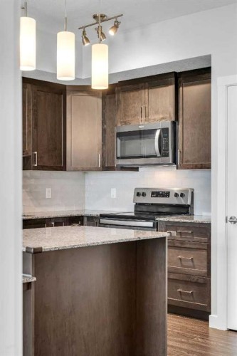 2409-3727 Sage Hill Drive Nw, Calgary, AB - Indoor Photo Showing Kitchen