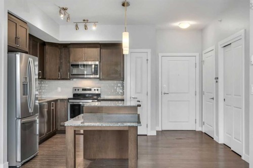 2409-3727 Sage Hill Drive Nw, Calgary, AB - Indoor Photo Showing Kitchen With Stainless Steel Kitchen