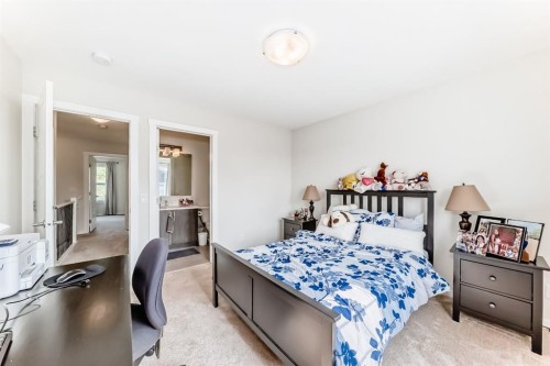 206 Cranbrook Square Se, Calgary, AB - Indoor Photo Showing Bedroom
