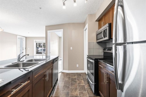 3108-625 Glenbow Drive, Cochrane, AB - Indoor Photo Showing Laundry Room