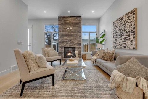 6416 34 Avenue Nw, Calgary, AB - Indoor Photo Showing Living Room With Fireplace