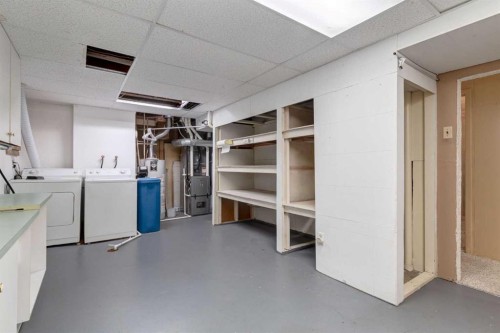 7404 Farrell Road Se, Calgary, AB - Indoor Photo Showing Laundry Room