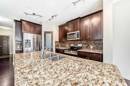 6 Evanspark Manor Nw, Calgary, AB - Indoor Photo Showing Kitchen With Double Sink With Upgraded Kitchen