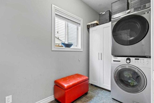 337 Bridleridge View Sw, Calgary, AB - Indoor Photo Showing Laundry Room