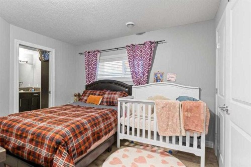 337 Bridleridge View Sw, Calgary, AB - Indoor Photo Showing Bedroom