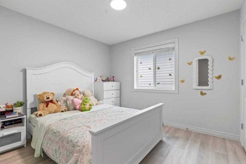 337 Bridleridge View Sw, Calgary, AB - Indoor Photo Showing Bedroom