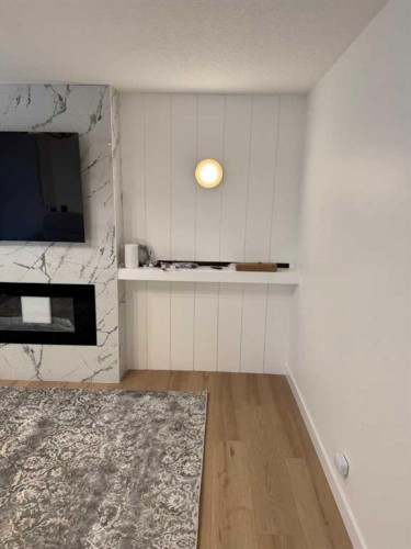 387 Templeview Drive Ne, Calgary, AB - Indoor With Fireplace