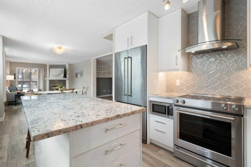 105-220 26 Avenue Sw, Calgary, AB - Indoor Photo Showing Kitchen With Upgraded Kitchen