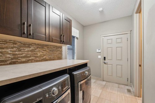 152 Evansborough Way Nw, Calgary, AB - Indoor Photo Showing Laundry Room