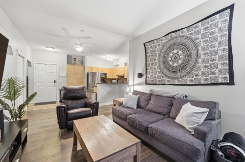 4311-70 Panamount Drive Nw, Calgary, AB - Indoor Photo Showing Living Room