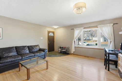 2018 Cottonwood Crescent Se, Calgary, AB - Indoor Photo Showing Living Room