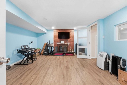 2018 Cottonwood Crescent Se, Calgary, AB - Indoor With Fireplace