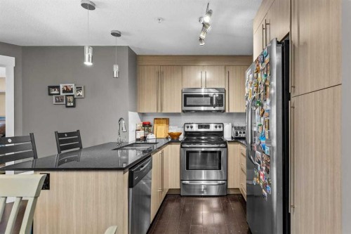 3204-11 Mahogany Row Se, Calgary, AB - Indoor Photo Showing Kitchen With Stainless Steel Kitchen With Upgraded Kitchen