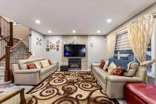 57 Saddlemead Road Ne, Calgary, AB - Indoor With Fireplace