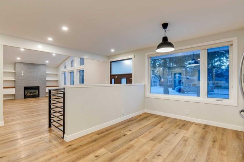 3416 Lane Crescent Sw, Calgary, AB - Indoor Photo Showing Other Room With Fireplace